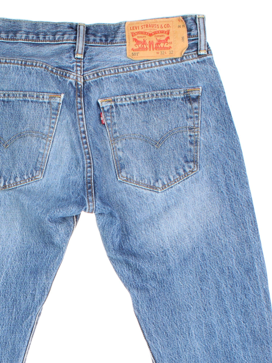 Levi Strauss 501 Jeans in blue colourway with multiple pockets and the logo tab embroidered on the back.