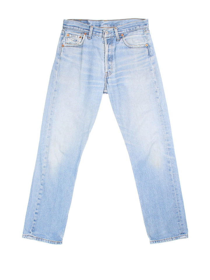 Levi Strauss 501 Jeans in blue colourway with multiple pockets and the logo tab embroidered on the back.