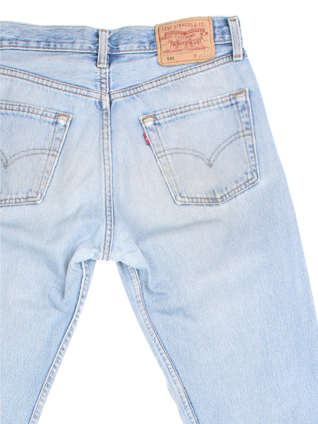 Levi Strauss 501 Jeans in blue colourway with multiple pockets and the logo tab embroidered on the back.