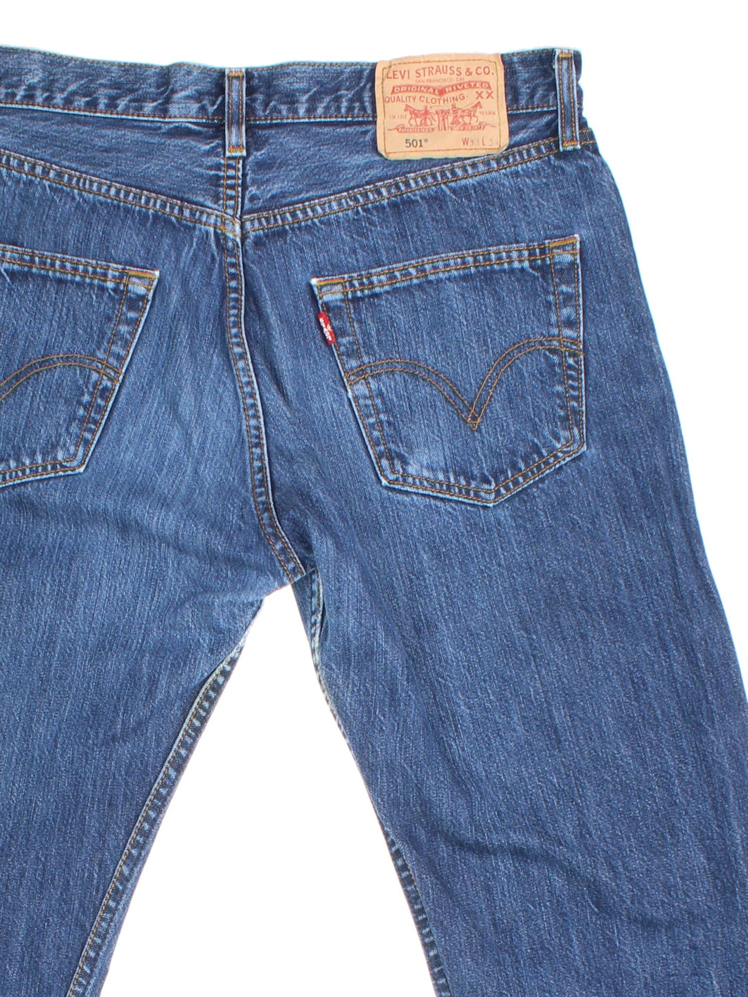 Levi Strauss 501 Jeans in blue colourway with multiple pockets and the logo tab embroidered on the back.