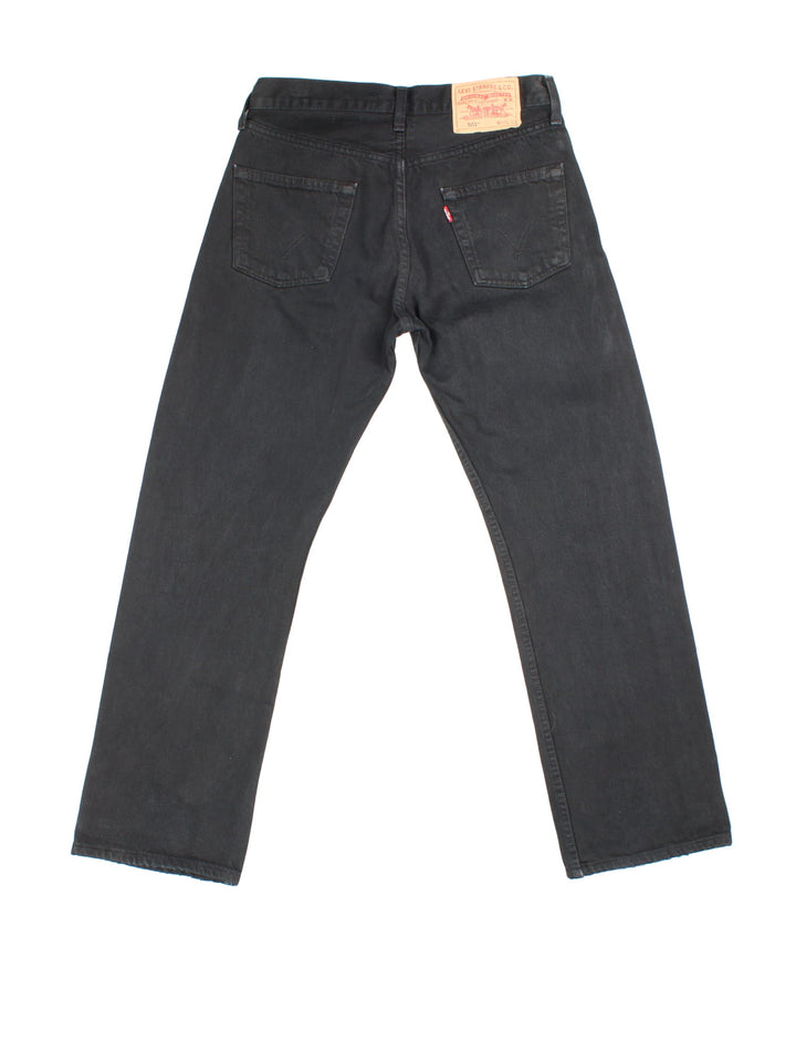 Levi Strauss 501 Jeans in black colourway with multiple pockets and the logo tab embroidered on the back.