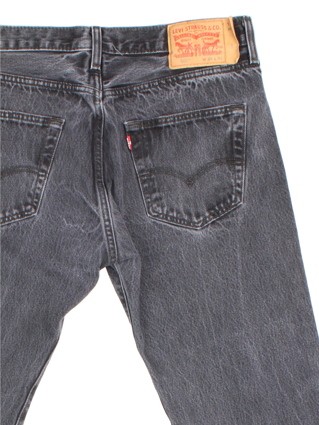 Levi Strauss 501 Jeans in grey colourway with multiple pockets and the logo tab embroidered on the back.