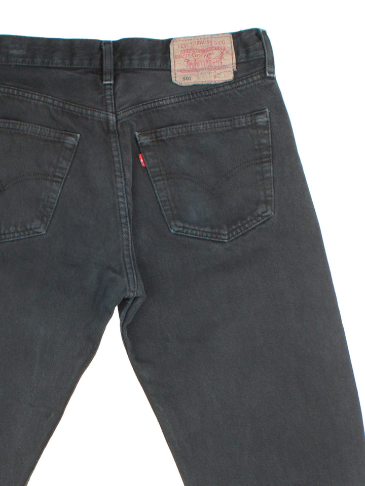 Levi Strauss 501 Jeans in black colourway with multiple pockets and the logo tab embroidered on the back.