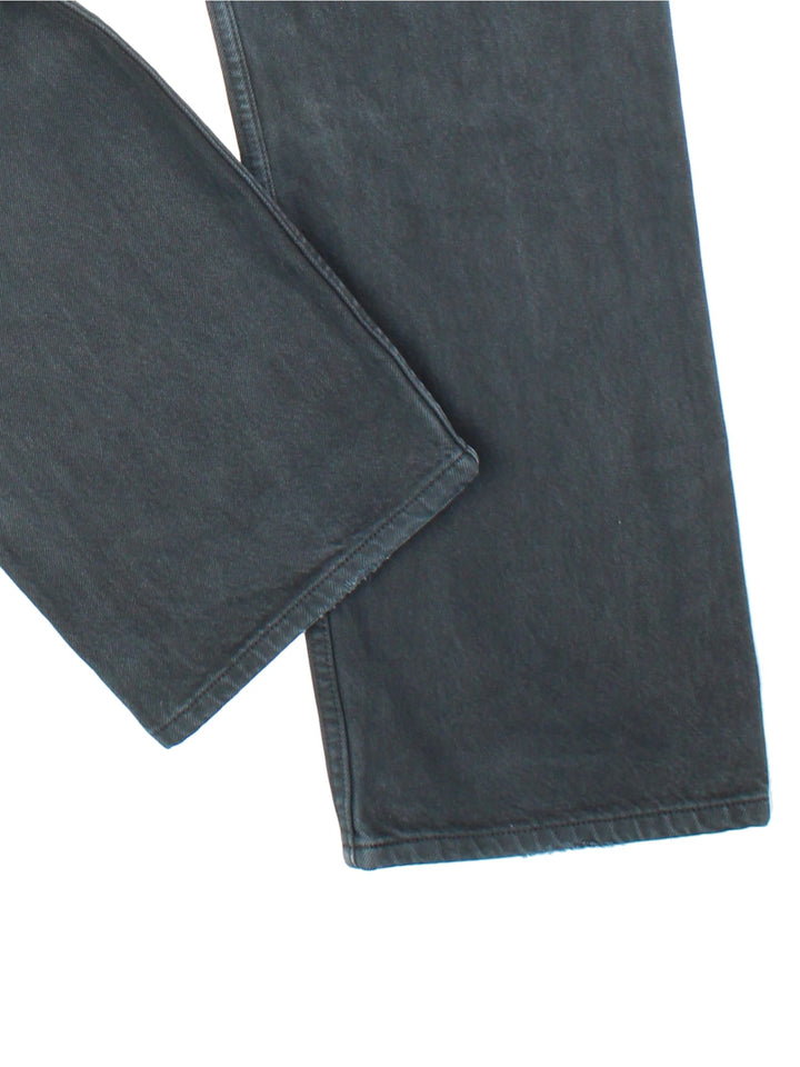 Levi Strauss 501 Jeans in black colourway with multiple pockets and the logo tab embroidered on the back.