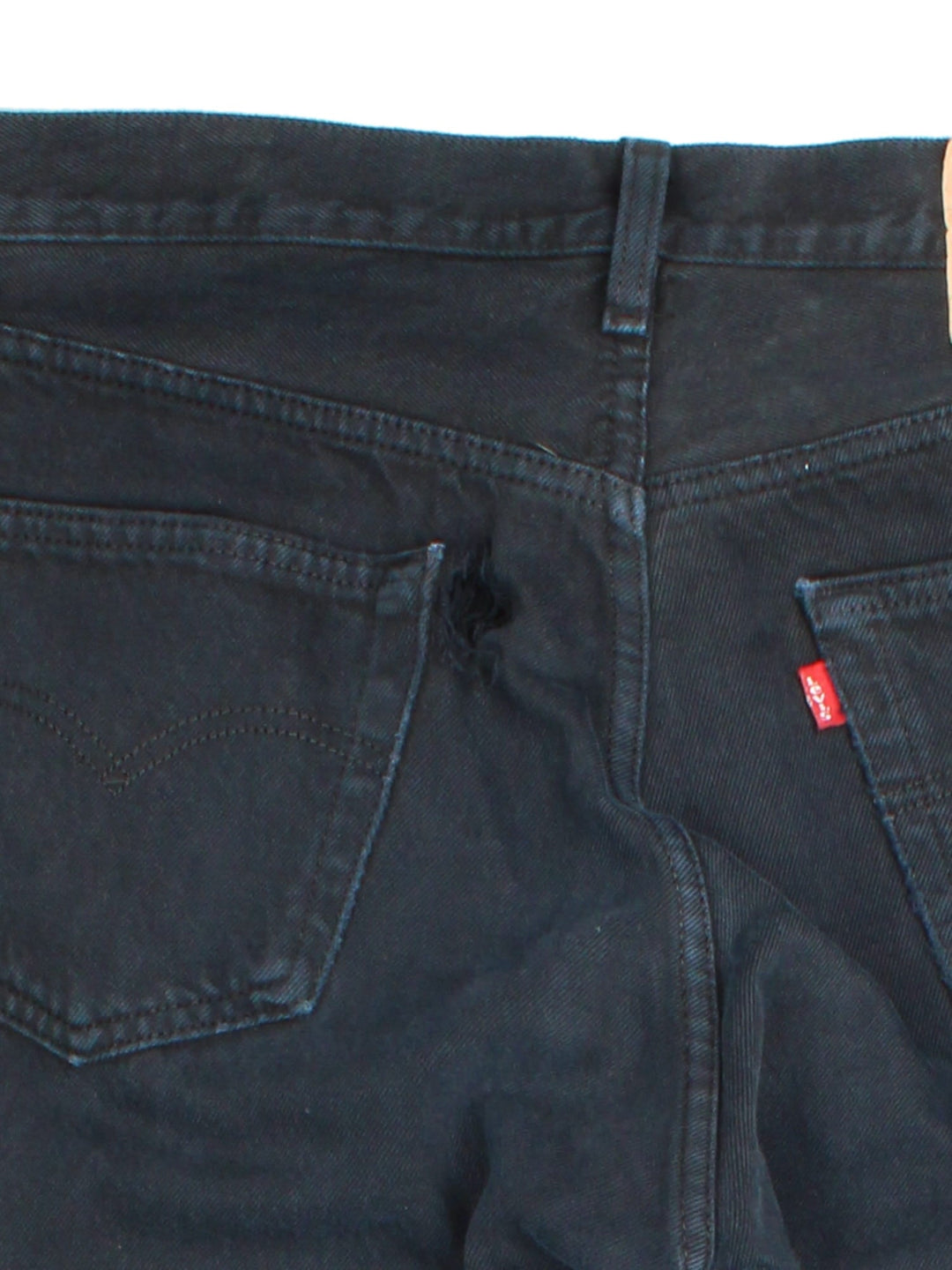 Levi Strauss 501 Jeans in black colourway with multiple pockets and the logo tab embroidered on the back.