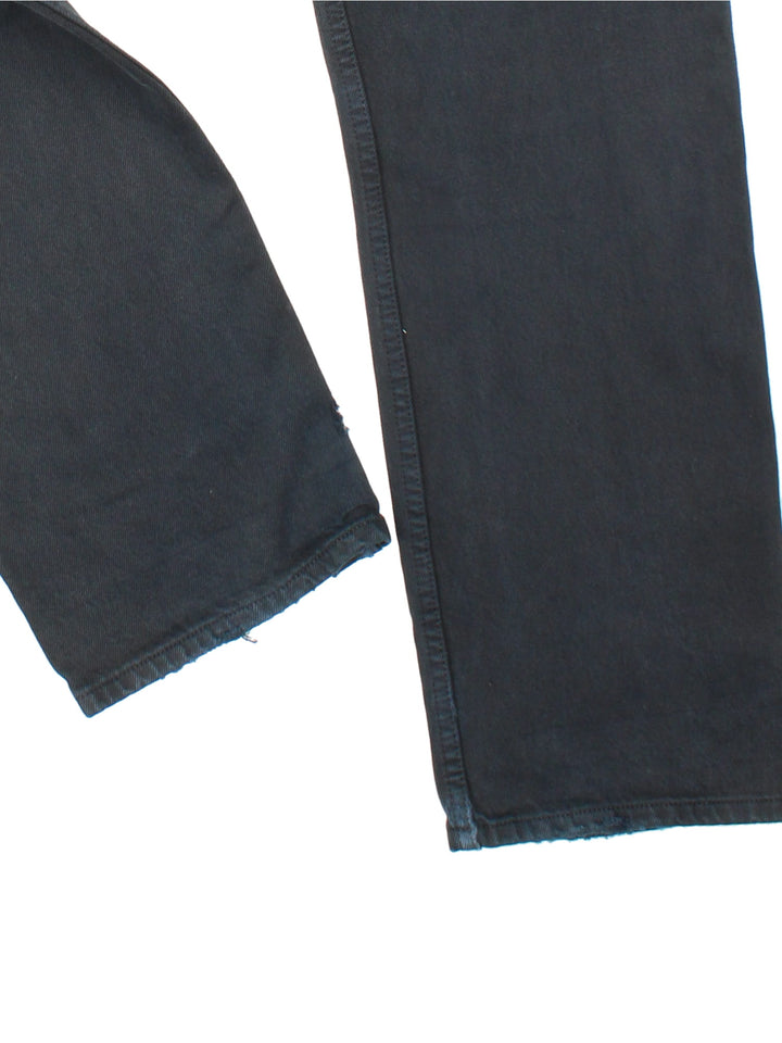 Levi Strauss 501 Jeans in black colourway with multiple pockets and the logo tab embroidered on the back.