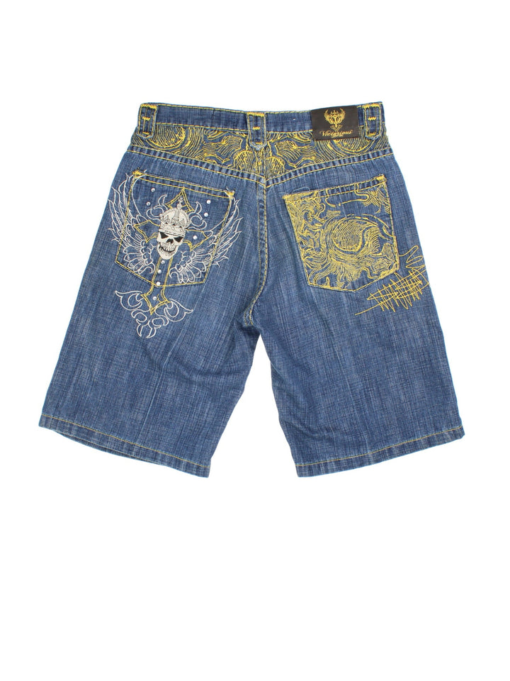 Y2K Victorious Jorts in blue colourway with multiple pockets and has the logo embroidered on the back, as well as contrast patterned cross stitching on the front and back, has skull and bead features.