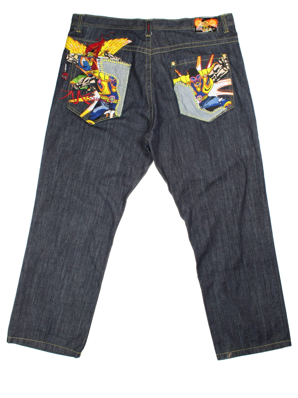 Y2K Miskeen Baggy Jeans in a dark blue colourway with multiple pockets, cross stitching details on the front and on the back has the logo embroidered alongside superhero characters on the pockets.