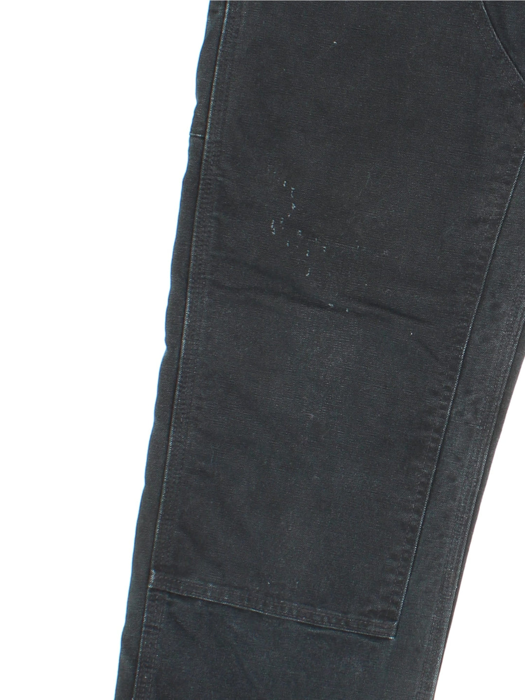 Carhartt Double Knee Jeans in black colourway with multiple pockets and the logo embroidered on the back.