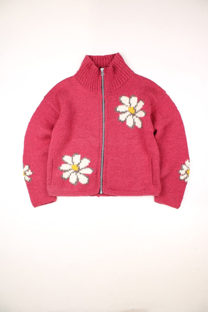 Vintage Pachamama Floral Cardigan in a pink colourway with flowers on the front and back.