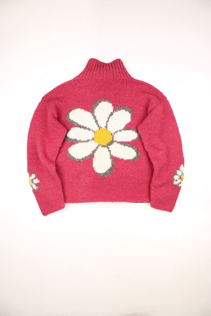 Vintage Pachamama Floral Cardigan in a pink colourway with flowers on the front and back.