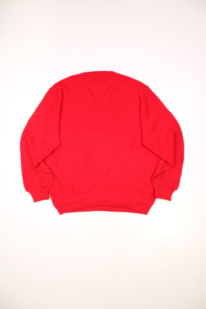 Vintage Izod Lacoste Knitted Jumper in a red colourway with a v neck and the logo embroidered on the front. 