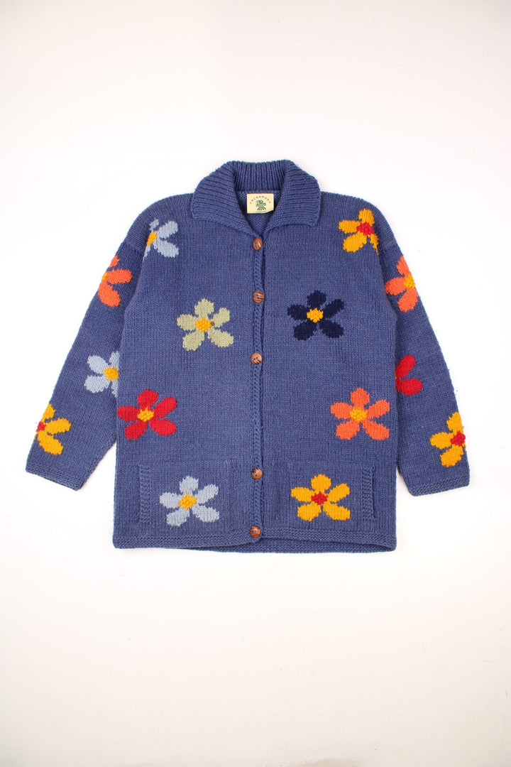 Vintage Pachamama Floral Knitted Cardigan in a blue colourway with multicoloured flowered embroidered all over, buttons up and has side pockets. 