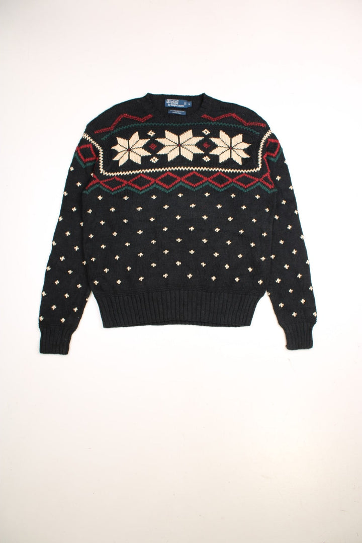 Ralph Lauren winter jumper in a black colourway. The knit has a Norwegian style pattern with snowflakes across the chest.