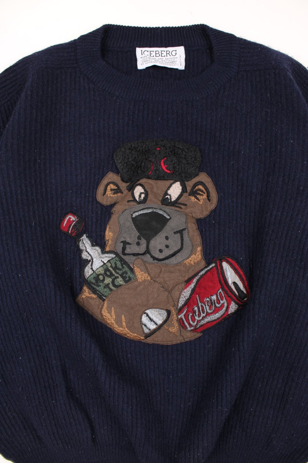 Vintage 90's Iceberg Drunk Bear Woolen Sweater in a blue colourway with drunk bear design embroidered on the front.