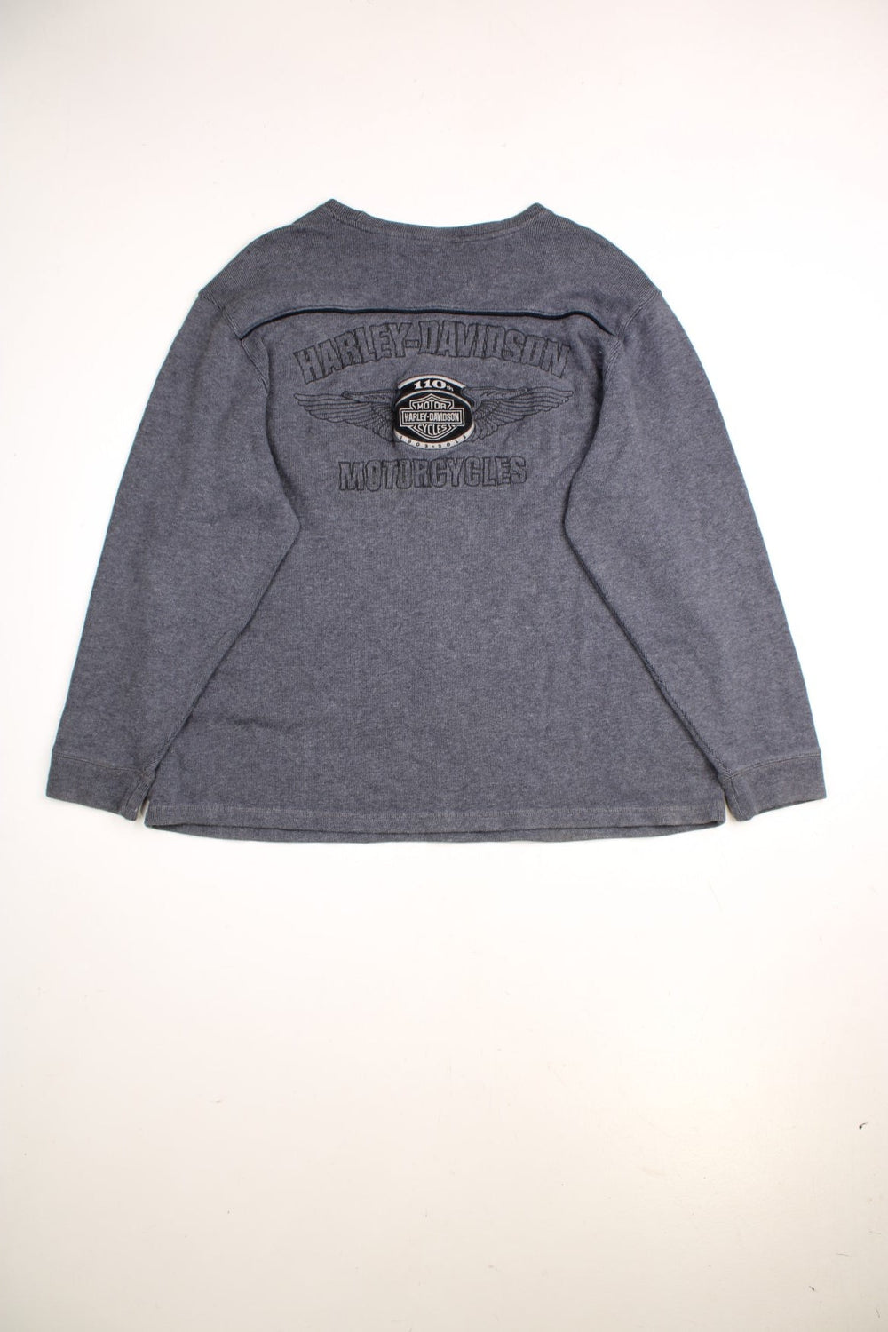 Harley-Davidson crew neck jumper in a grey colourway with an embroidered logo on front and a large patch on the back.