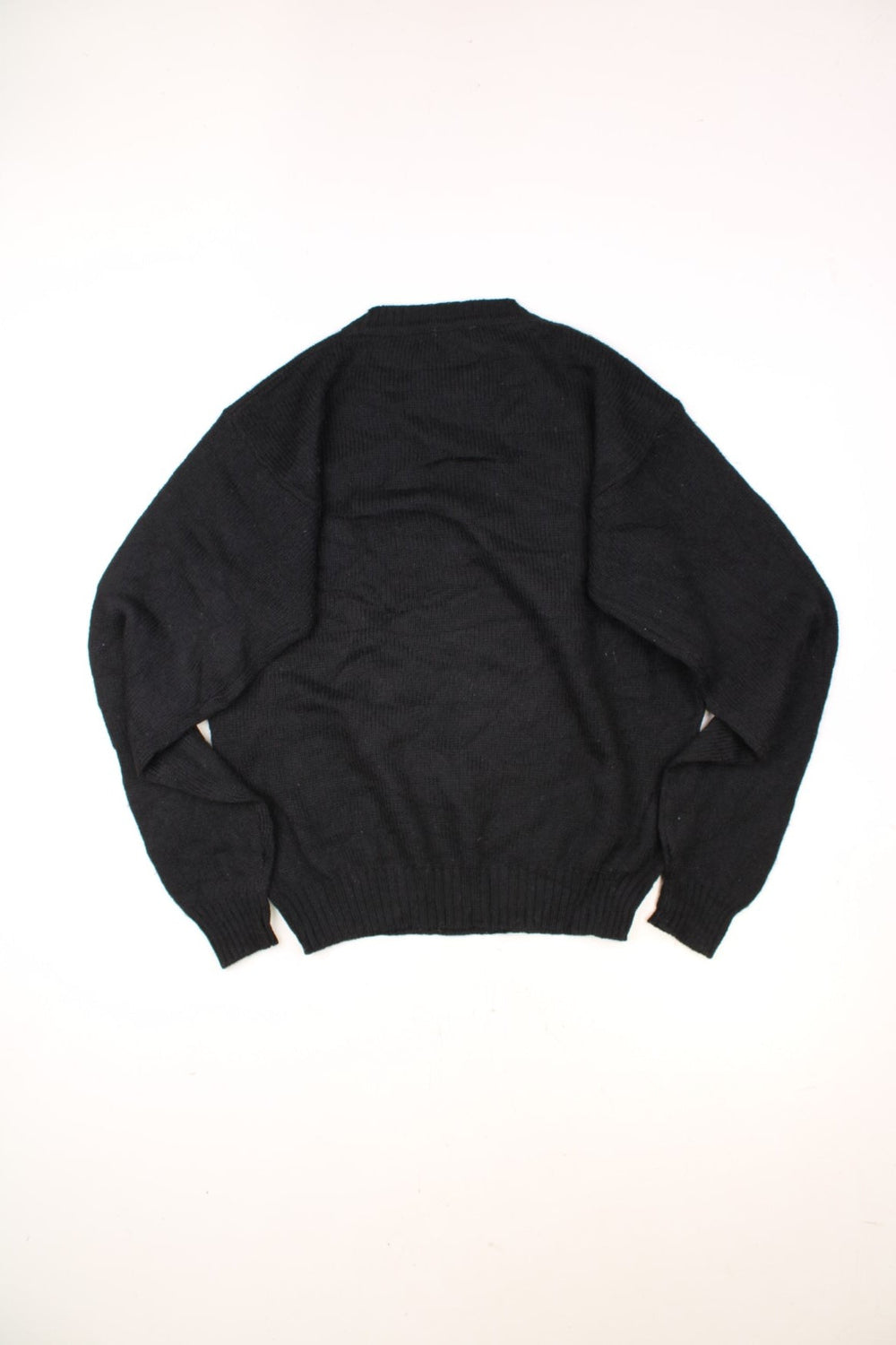 Izod Lacoste Knitted Jumper in a black colourway with the logo embroiderd on the chest. 