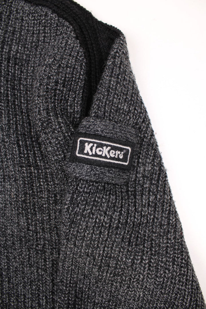 Grey and black Kickers funnel neck knit jumper with embroidered badge on the sleeve.