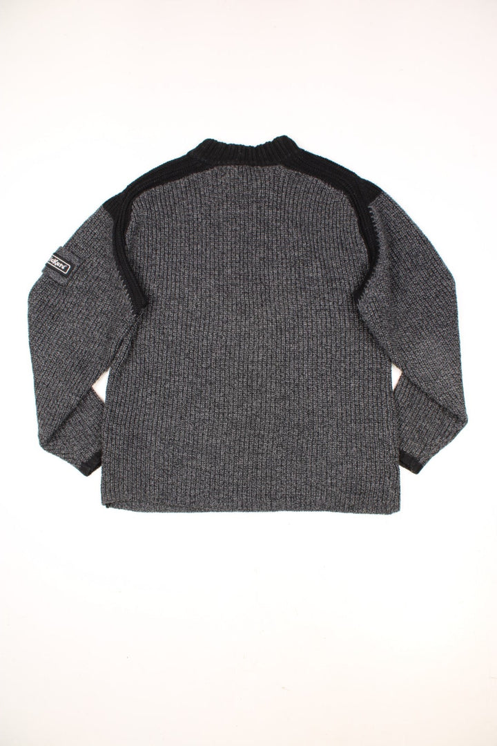 Grey and black Kickers funnel neck knit jumper with embroidered badge on the sleeve.