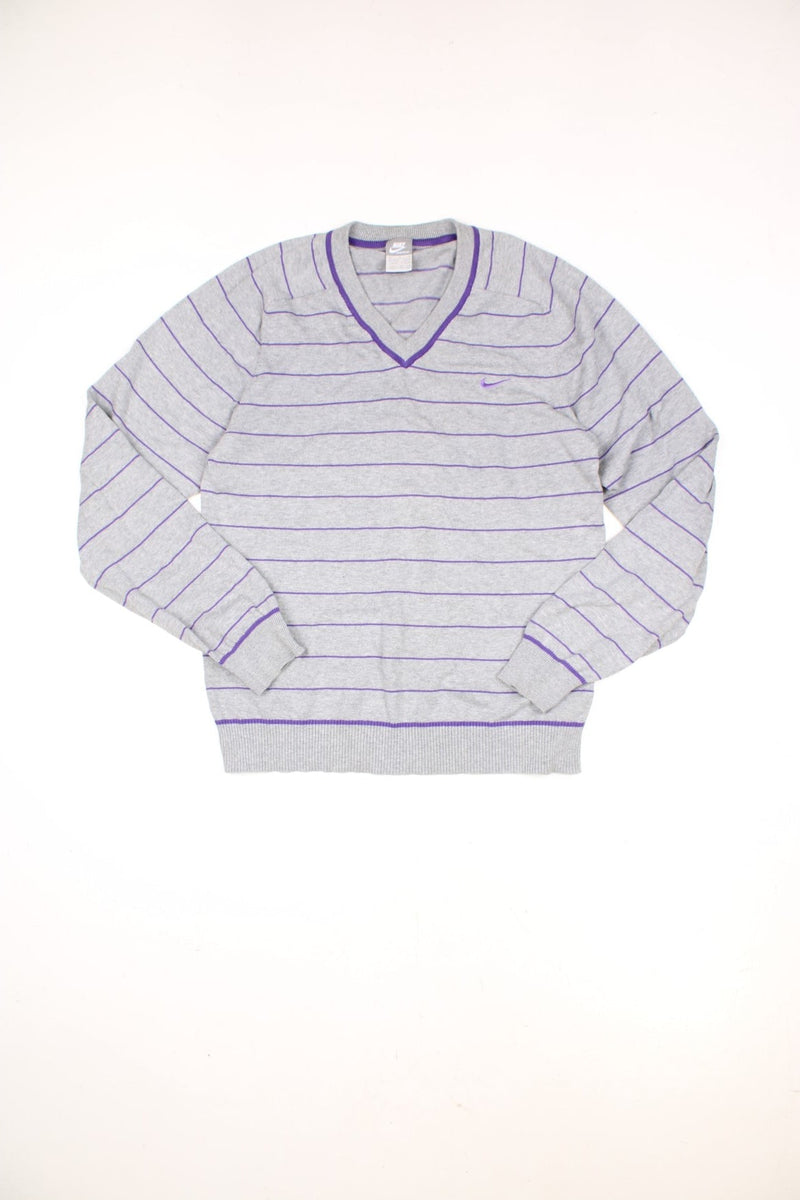 Vintage Nike grey and purple striped v neck sweatshirt with embroidered logo on the chest.