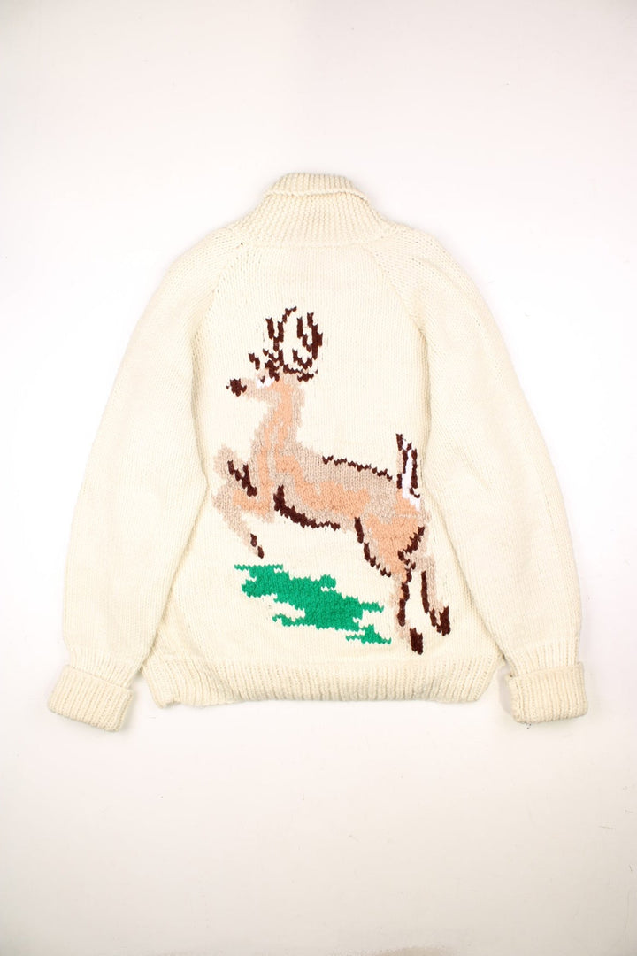 Vintage 70's Cowichan Deer Sweater in a white colourway, zips up and has two pockets, and the deer graphic embroidered on the front and back.