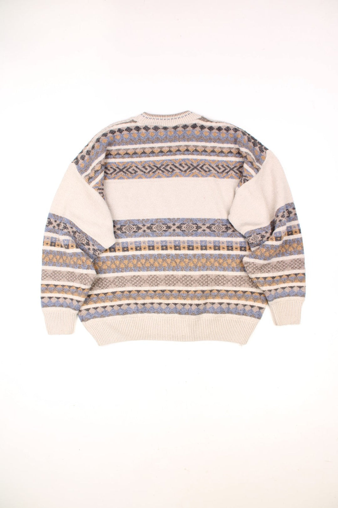 Vintage The Sweater Shop Patterned Knitted Jumper in a cream, blue, black and orange striped colourway with the spell out logo embroiderd across the front. 