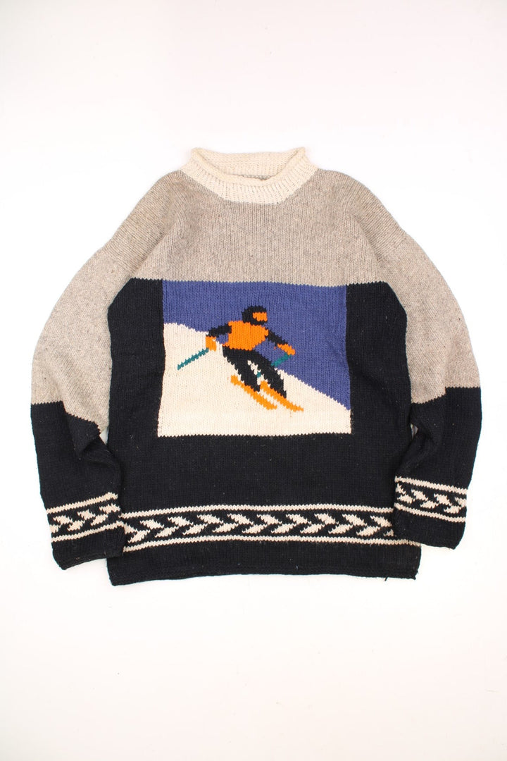 Vintage Yarina Wool Skiing Knitted Jumper in a grey and black colourway with skiing slopes graphic on the front and back. 