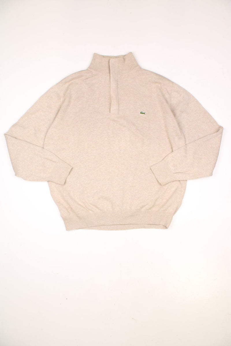 Lacoste 1/4 zip pullover sweatshirt in beige with embroidered logo on the chest.