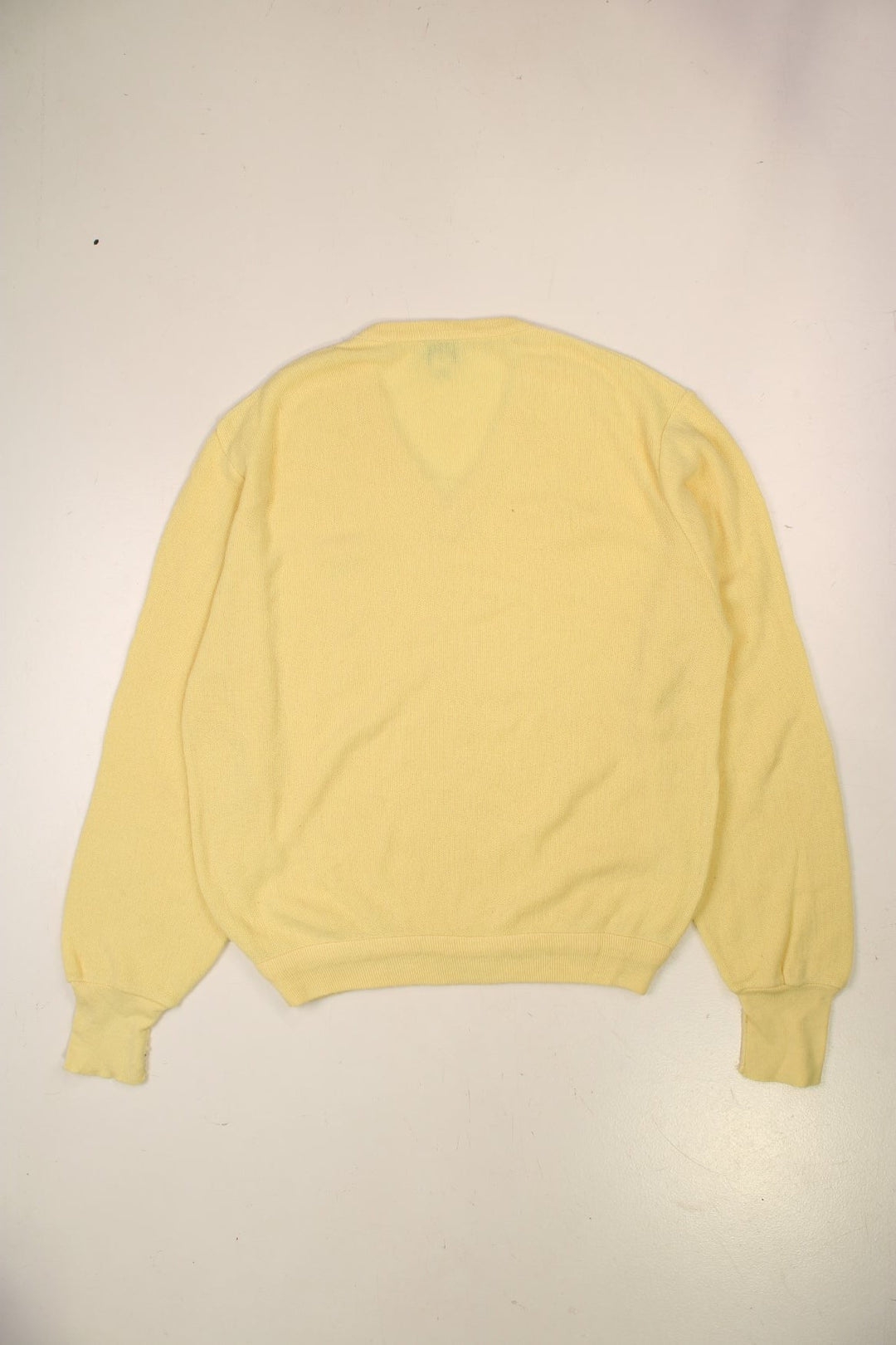 Lacoste lightweight v-neck jumper in yellow with an embroidered crocodile logo on the front.