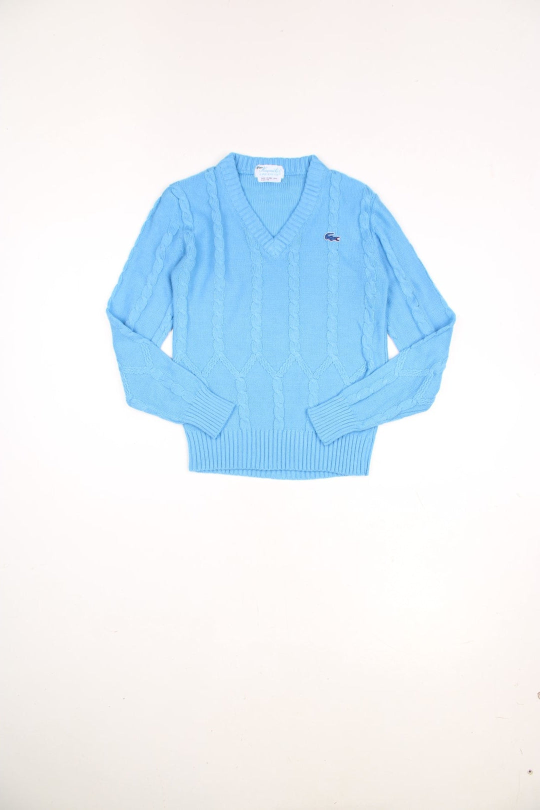 Vintage Haymaker Lacoste v-neck cable knit jumper in blue. Features signature embroidered logo on the chest.