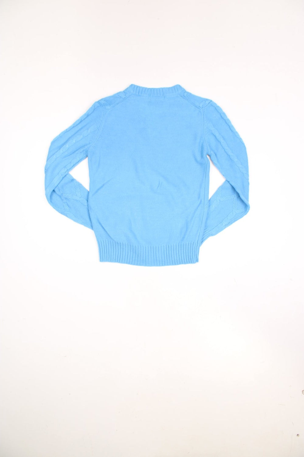 Vintage Haymaker Lacoste v-neck cable knit jumper in blue. Features signature embroidered logo on the chest.