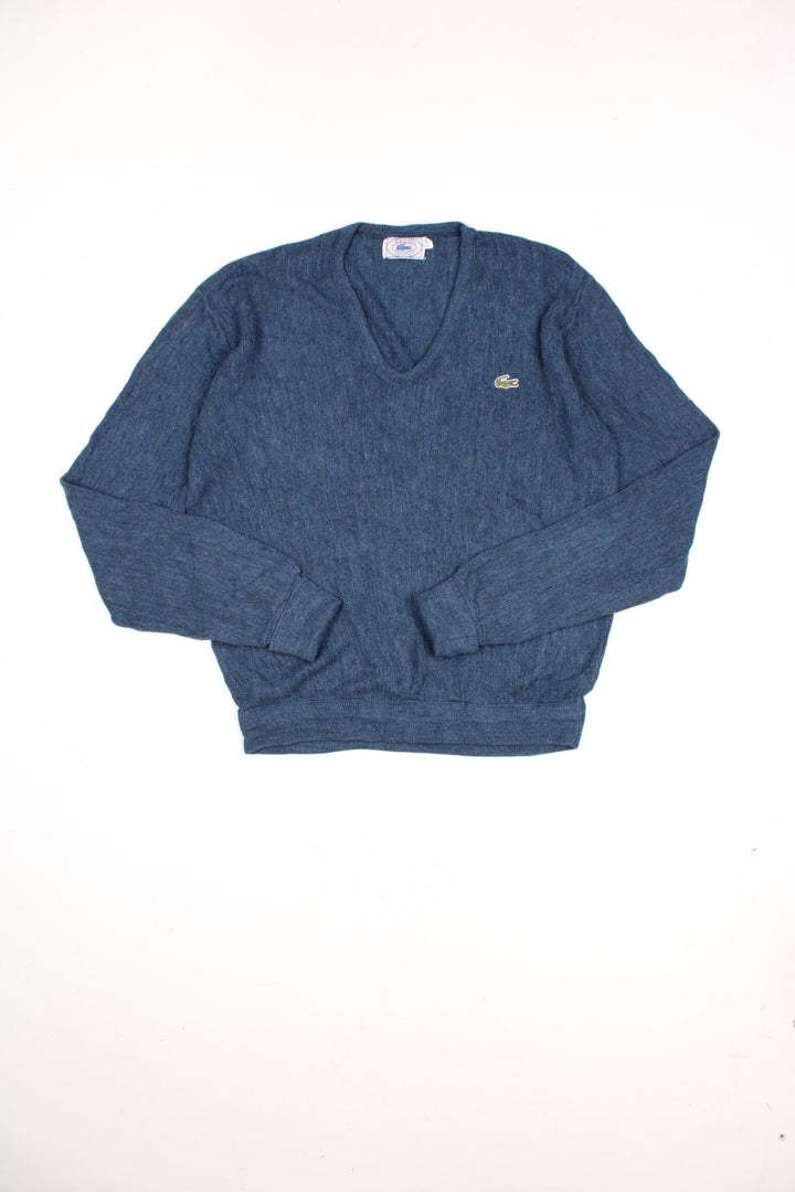 Vintage Lacoste Izod knitted sweatshirt in blue with signature embroidered logo on the chest.