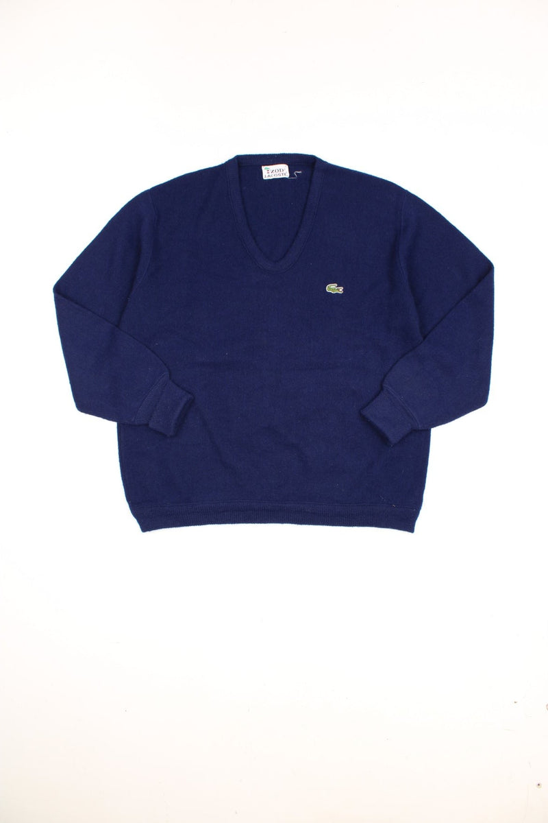 Vintage Lacoste Izod knitted sweatshirt in blue with signature embroidered logo on the chest.