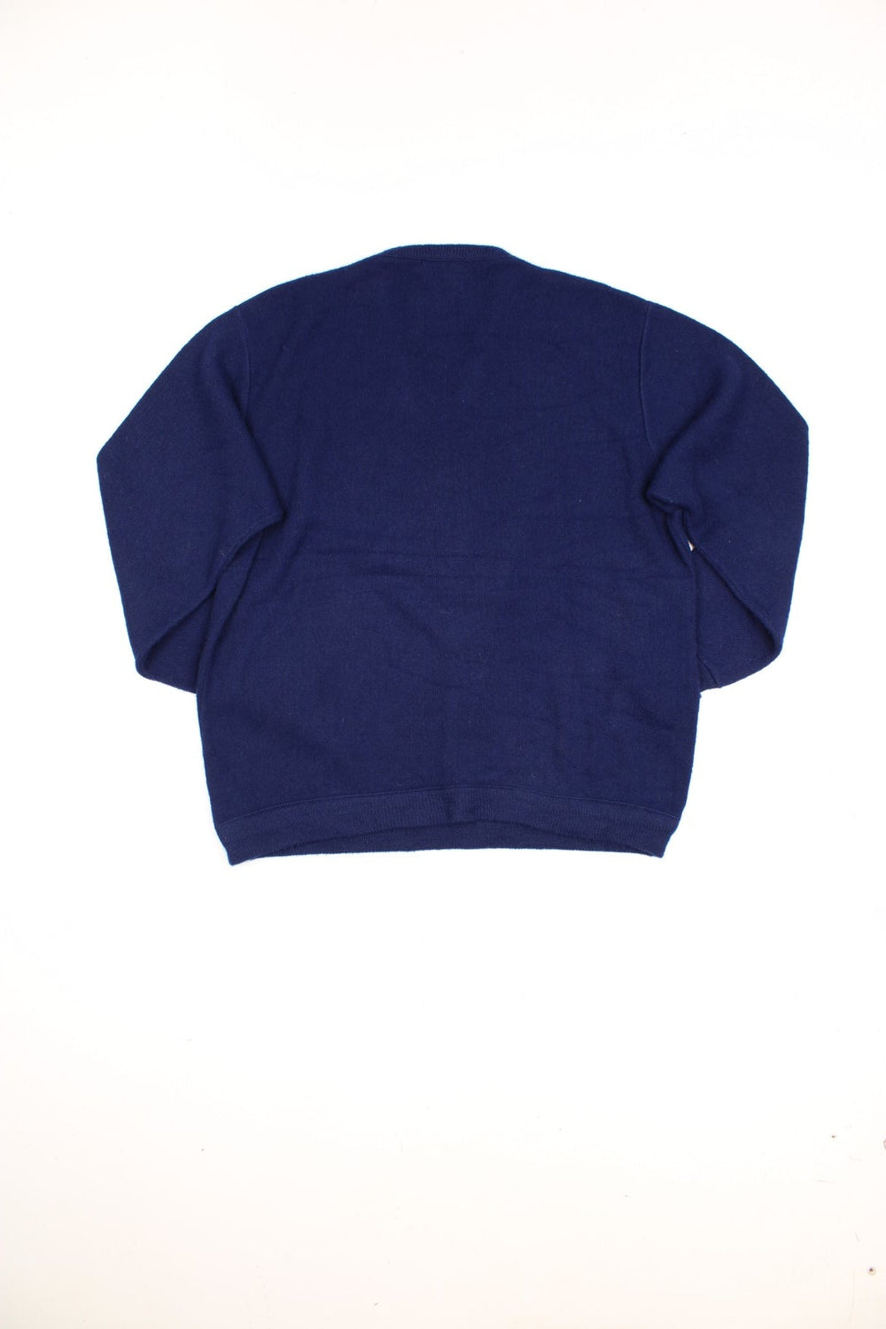 Vintage Lacoste Izod knitted sweatshirt in blue with signature embroidered logo on the chest.