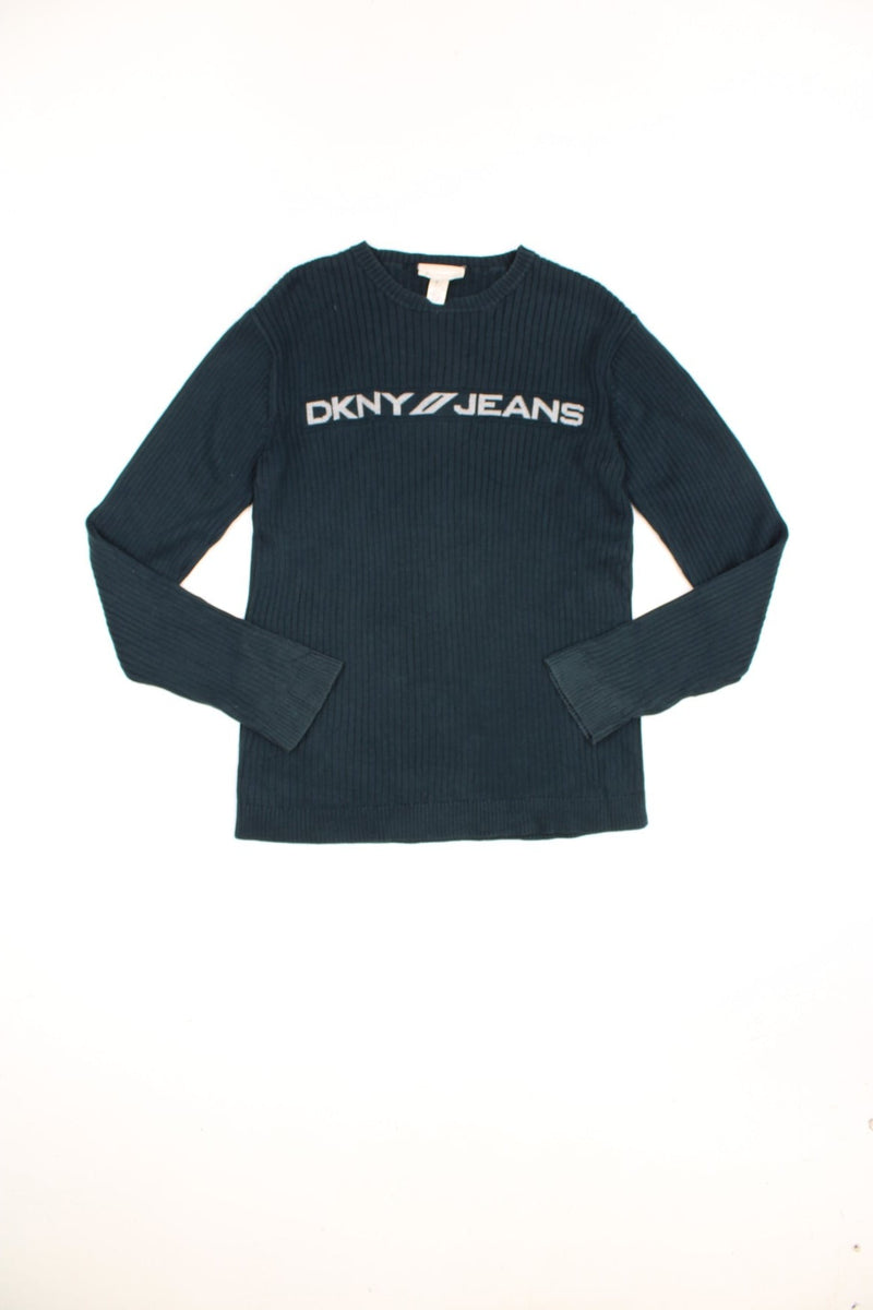 Vintage DKNY Jeans ribbed sweatshirt in dark navy blue. Features spell out logo across the chest.