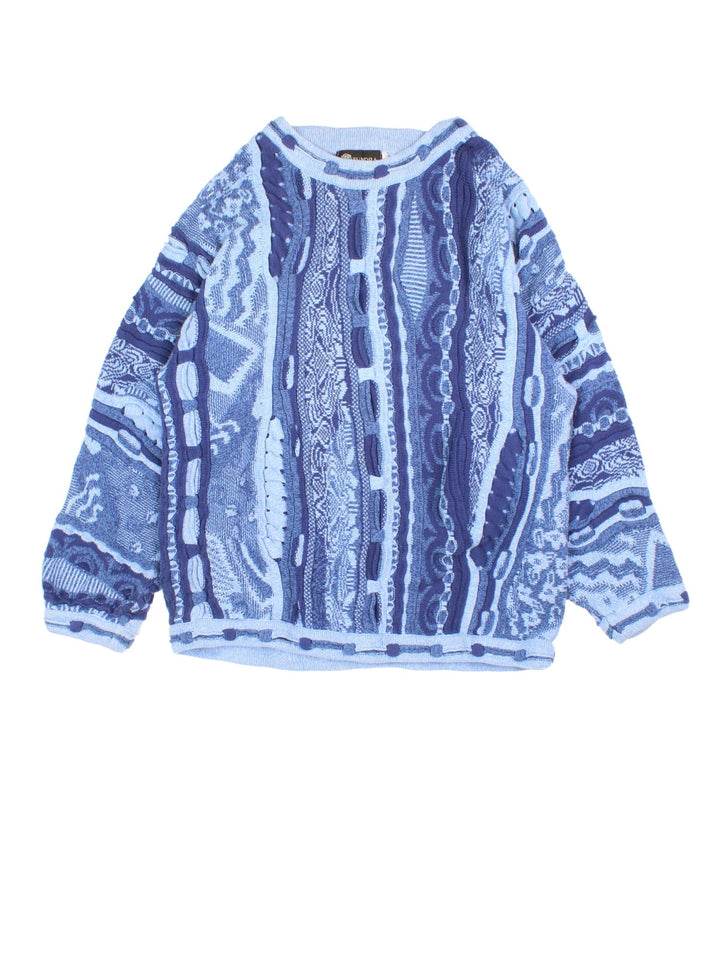 Vintage 90's Tundra Jumper in a blue multi colourway. Textured knit with crewneck and cuffed hems.