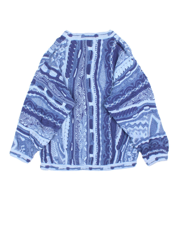 Vintage 90's Tundra Jumper in a blue multi colourway. Textured knit with crewneck and cuffed hems.