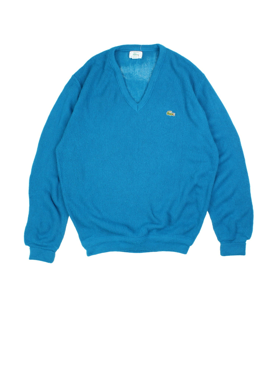 Lacoste IZOD Jumper in a blue colourway. V neck, with cuffed hems and embroided logo.