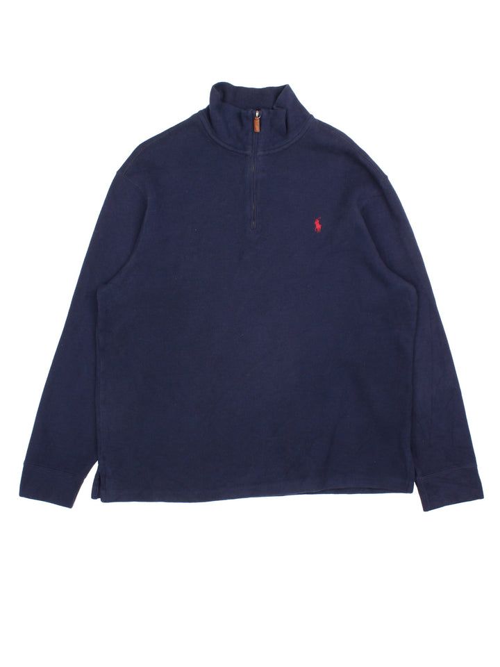 Ralph Lauren 1/4 Zip Jumper in a blue colourway, with embroidered logo on front.