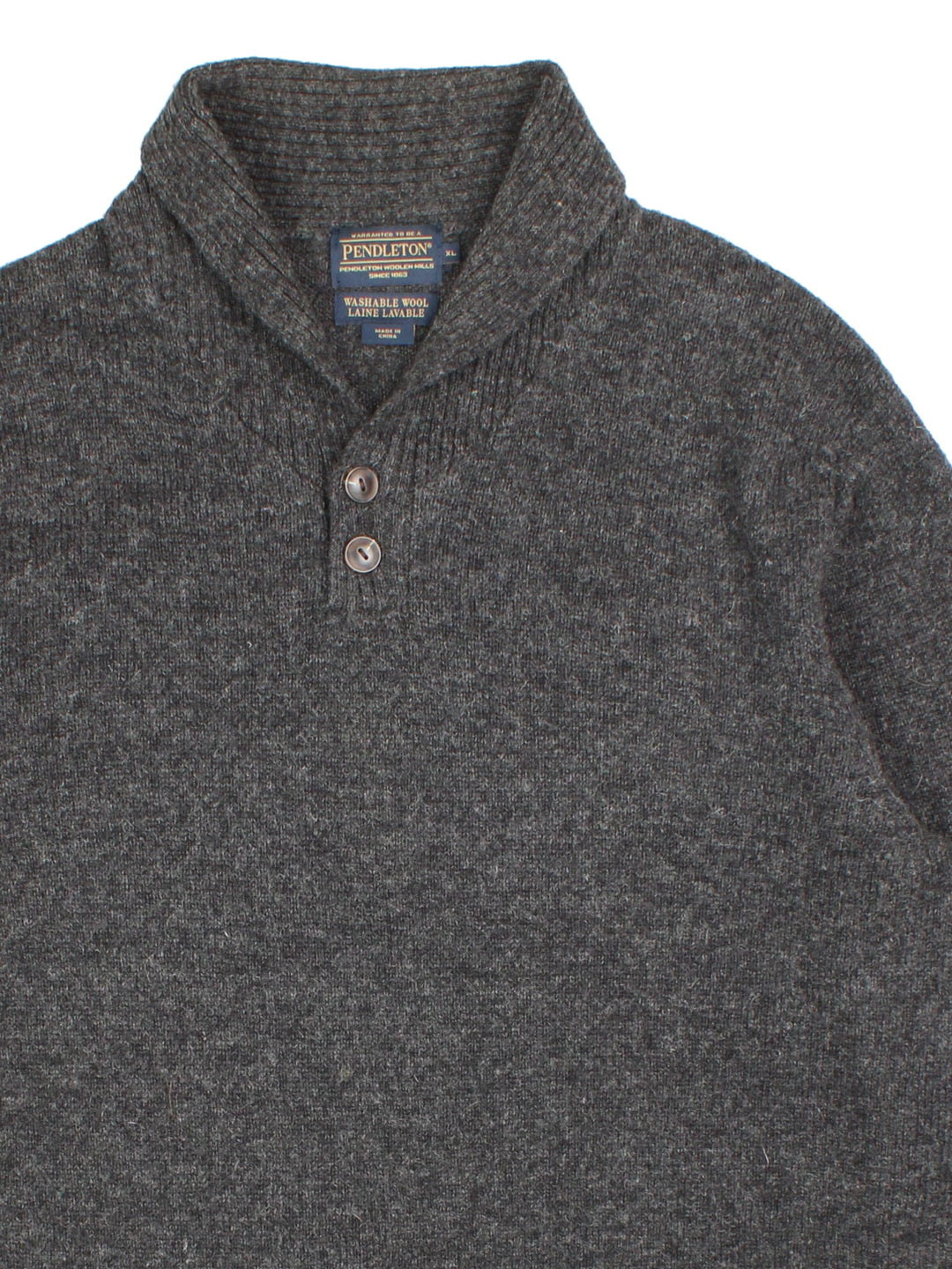 Pendleton Jumper in a grey colourway. Button up neckline and ribbed cuffed hems.