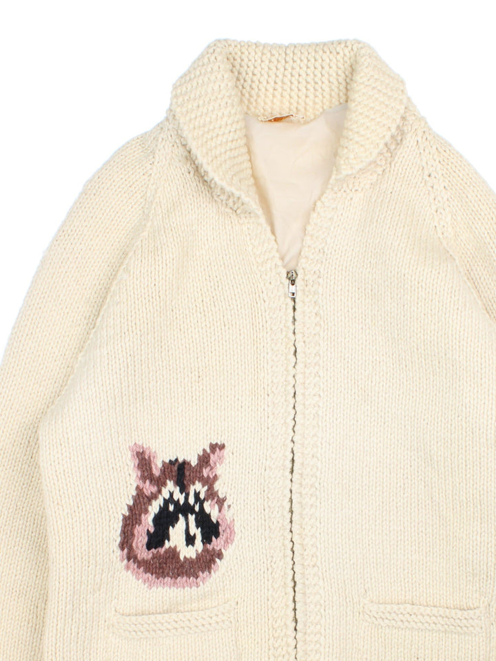 Vintage Cowichan Hand Knitted Cardigan in a tan colourway. Zip up with raccoon on front and back.