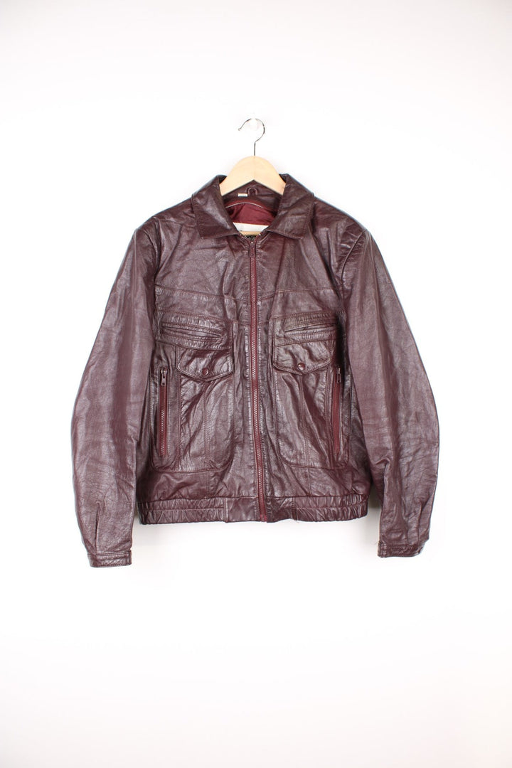 Vintage 70's Wilsons Leather Jacket in a brown colourway, zip up with multiple pockets and has a nylon lining. 