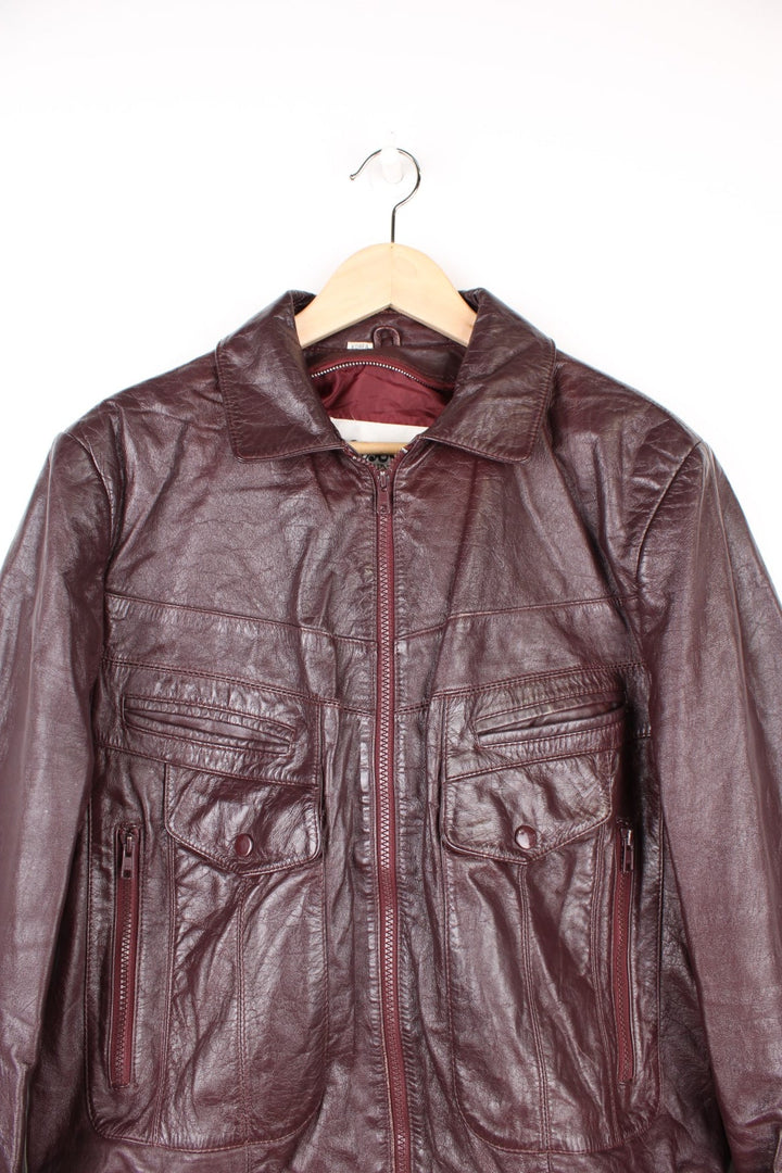 Vintage 70's Wilsons Leather Jacket in a brown colourway, zip up with multiple pockets and has a nylon lining. 