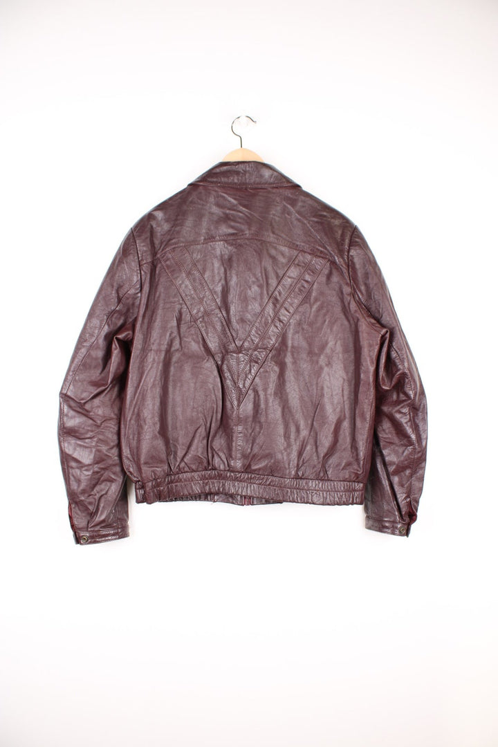 Vintage 70's Wilsons Leather Jacket in a brown colourway, zip up with multiple pockets and has a nylon lining. 