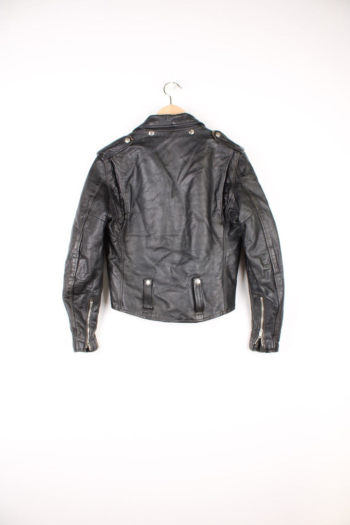 Vintage Harley Davidson Leather Biker Jacket in a black colourway, zip up with multiple pockets, insulated with a quilted lining, and has buckles on the front and back.