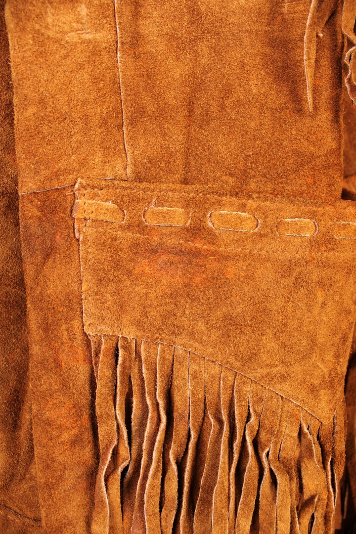 Vintage Pioneer Wear Western Leather Fringe Jacket in a brown colourway, button up with side pockets, big collar, and has fringe tassels throughout. 