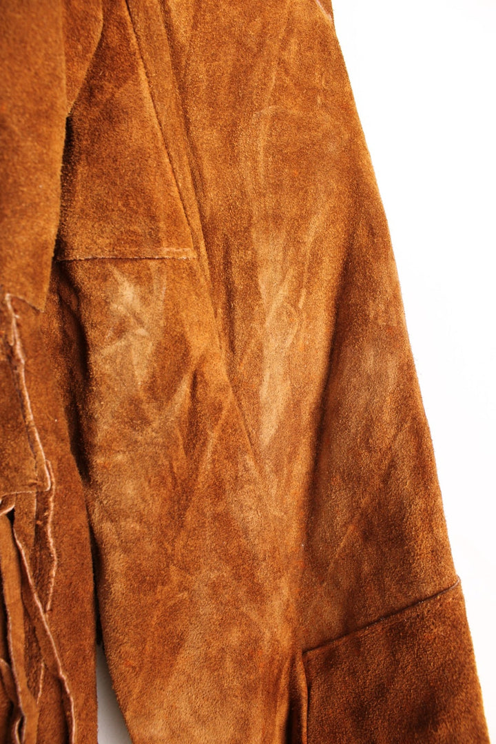 Vintage Pioneer Wear Western Leather Fringe Jacket in a brown colourway, button up with side pockets, big collar, and has fringe tassels throughout. 