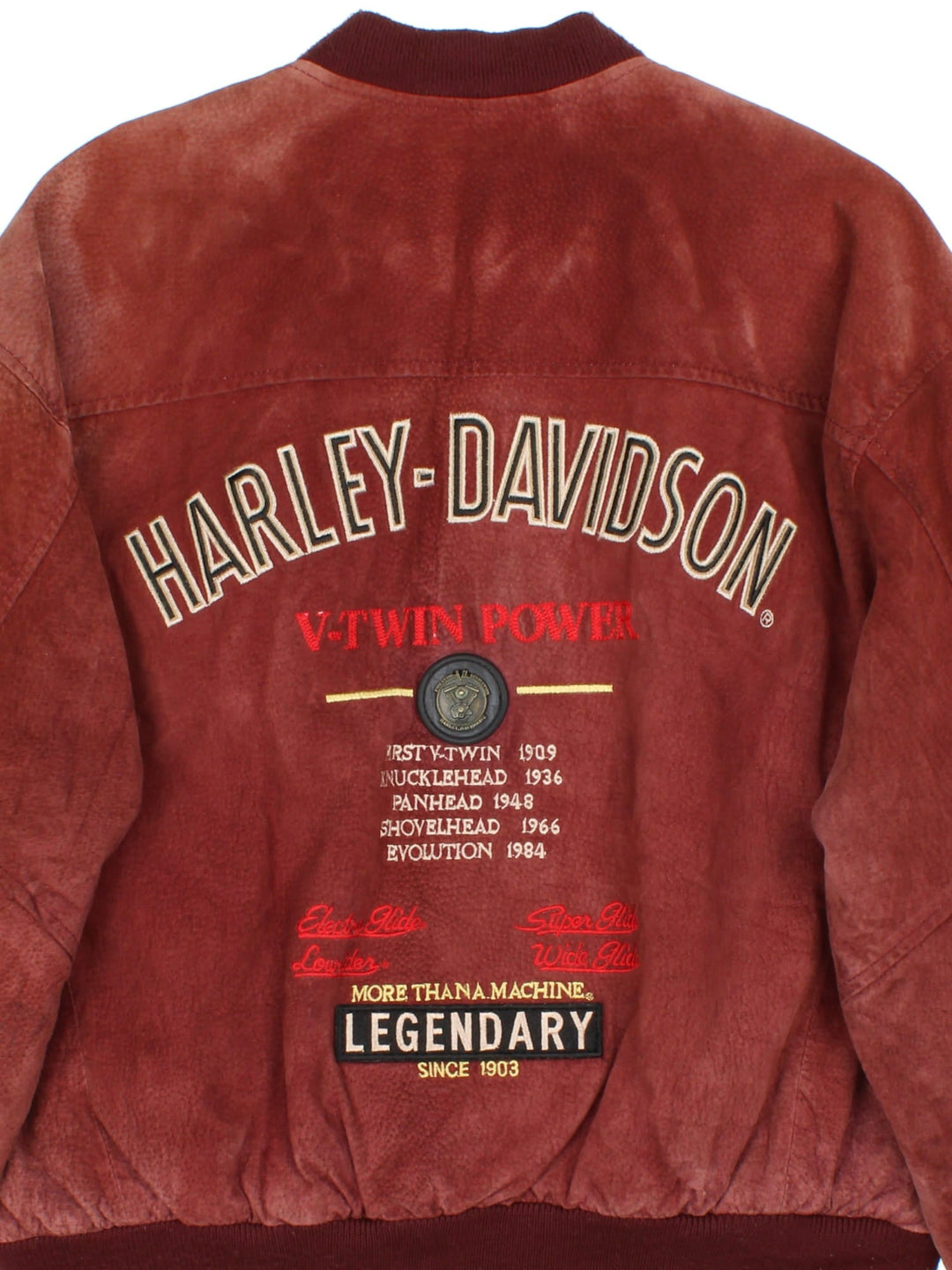 Harley-Davidson Leather Bomber Jacket in a red colourway. Full zip with multiple pockets on the front and inside. Detailling across the back with V twin badge and crest.