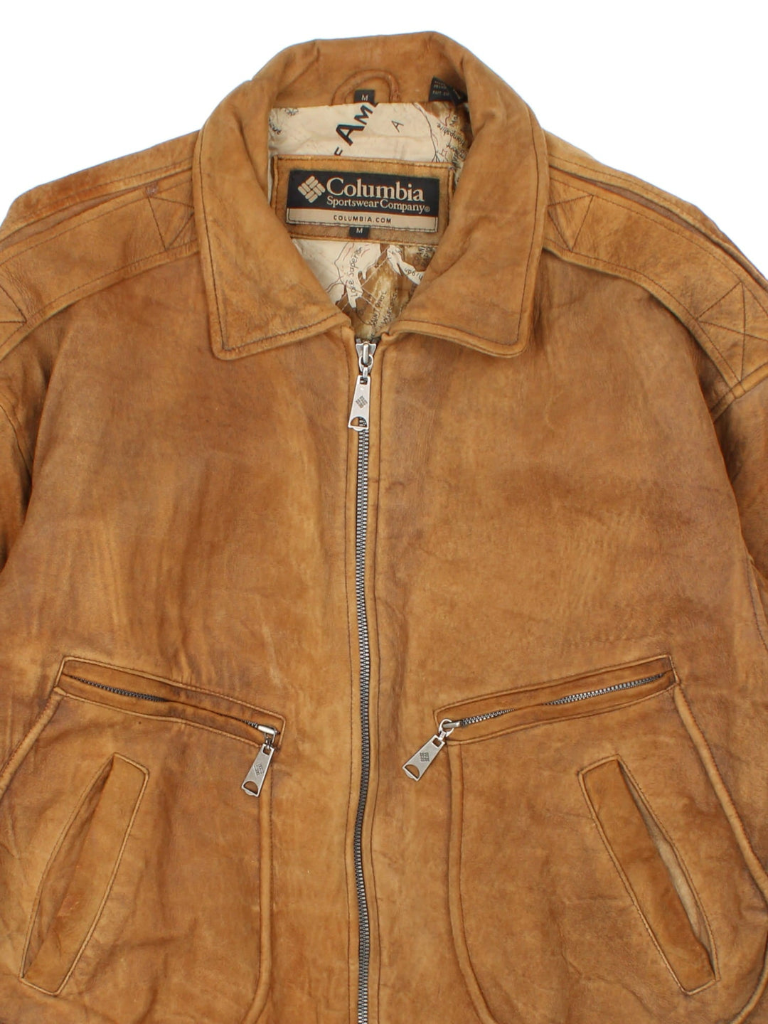 Columbia Leather Flight Jacket in a brown colourway. Full zip up with multiple pockets on the front. Brown cuffed hems with detailed interior lining.