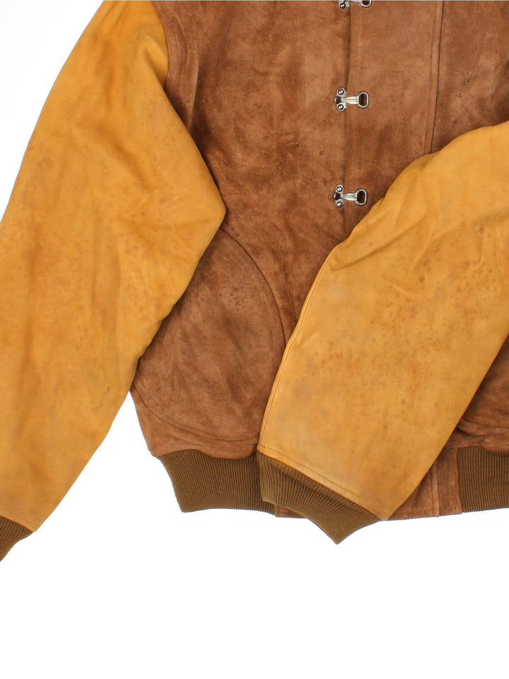 Ralph Lauren Leather Bomber Jacket in a brown colourway. Metal clasps on the front with double pocket, Tan coloured sleeves with brown cuffed hem.